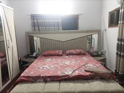 Bedroom set including bed, siders, dressing table and 4 door cupboard