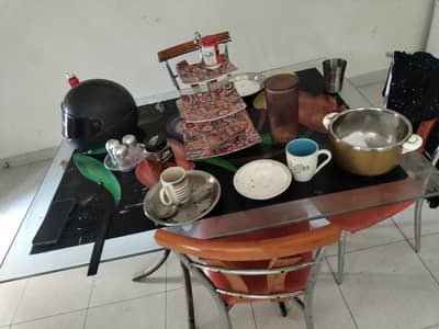 glass dining table and 4 chairs