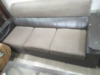 wooden armed sofa good condition  expensive fabric used in poshish