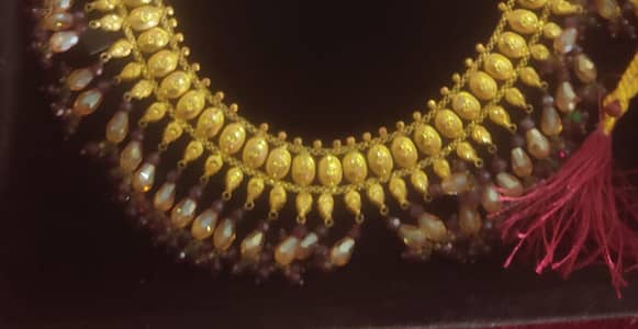 2 tola gold  19.5 cirat