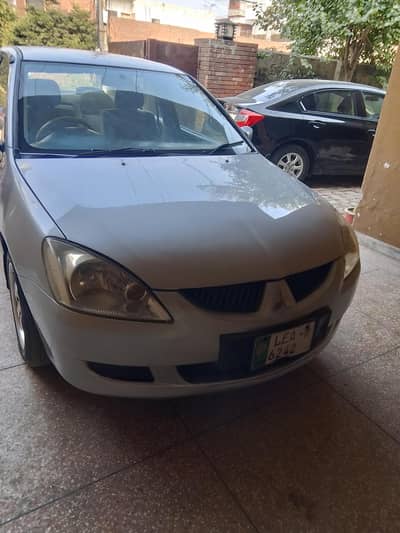 Mitsubishi lancer 2005/2007  Auto transmission bahir se puri paint he