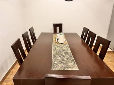 Wooden dinning table with chairs