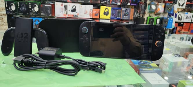 NITENDO SWITCH 2 SLIGHTLY USED WITH COMPLETE ACCESSORIES
