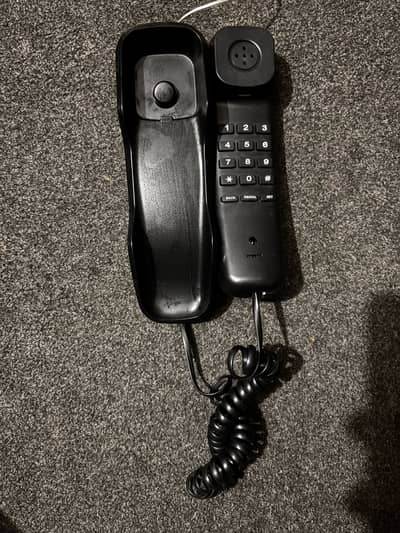 LEBOSS black corded landline telephone.