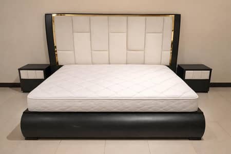 slightly used bed with two sides