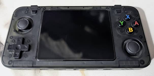 R36h retro gaming comsole ( slightly used)