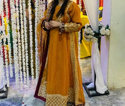 Focuses on the fabric, design, and texture of the dresses.