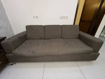 5 seater sofa set and a storage box.