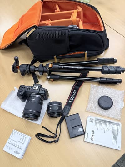 Canon EOS RP Mirrorless Camera with 2 lens+tripod+bg Only 900 Shutter