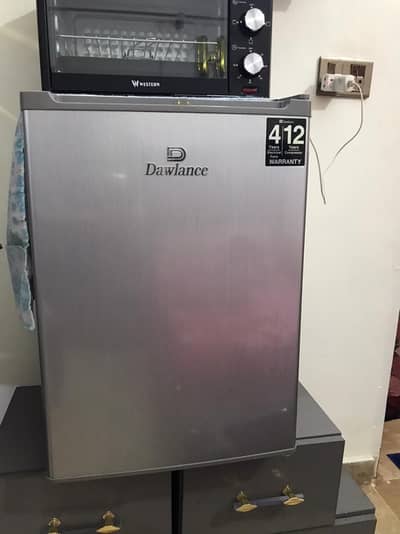 Dawlance mini fridge one door