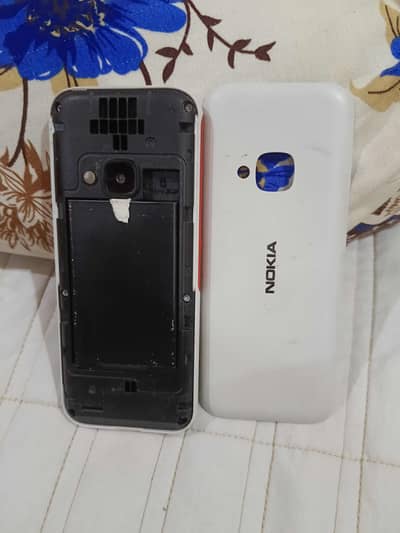 nokia 5310 dual sim with charger . not repaired