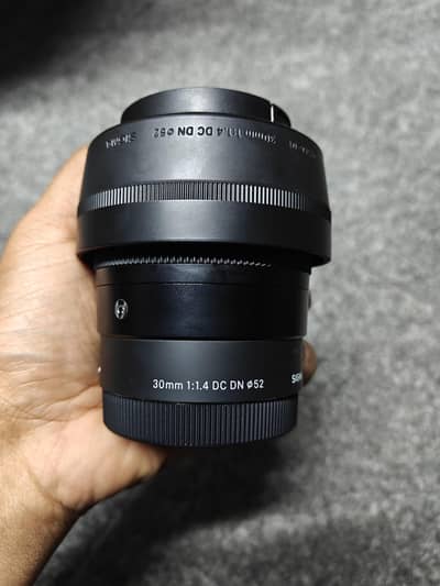 sigma 30mm 1.4 condition new