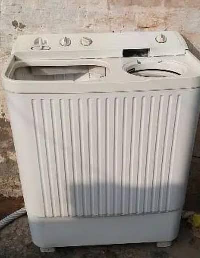 Haier two in one washing machine in perfect working condition.