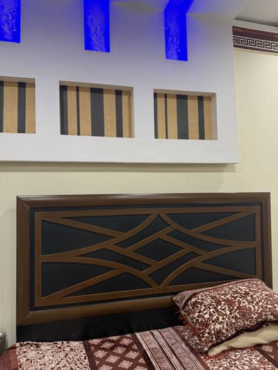 King size bed with side table and dressing