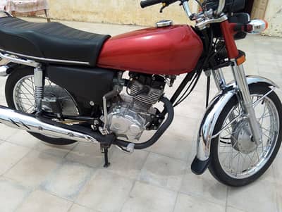 Honda 125 nut to nut genuine