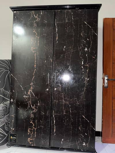 Double door wardrobe in black colour for sale