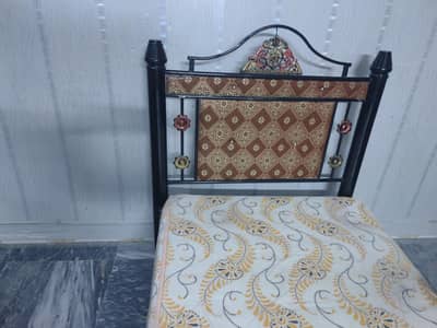 single iron bed with mattress in neat and clean condition