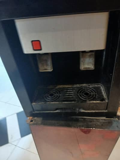 water dispenser good condition 10/8 with refrigerator and two taps.