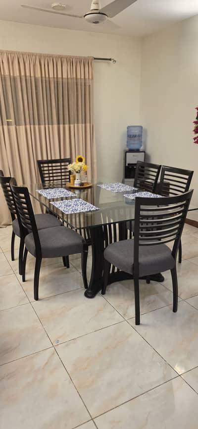 Wooden Dinning table with 6 chairs