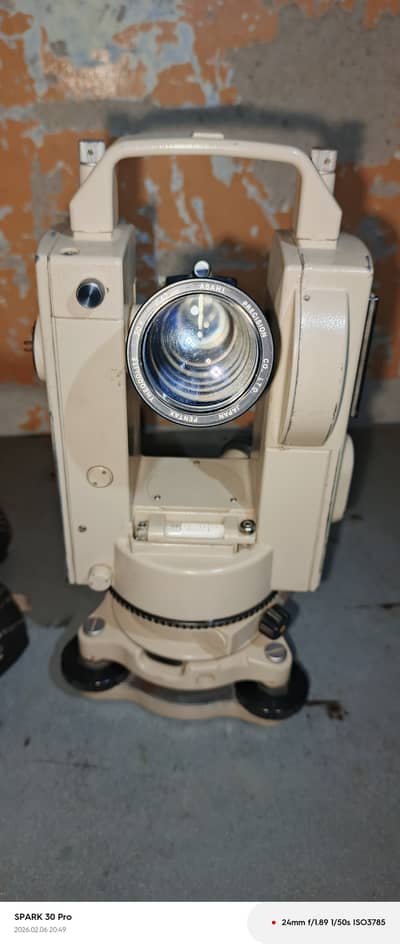 This is a Pentax theodolite, a precision instrument used in surveyi