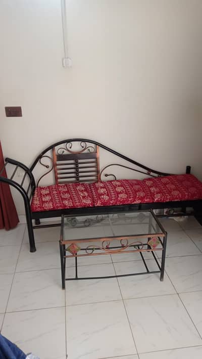 Iron deewan sofa with table glass top