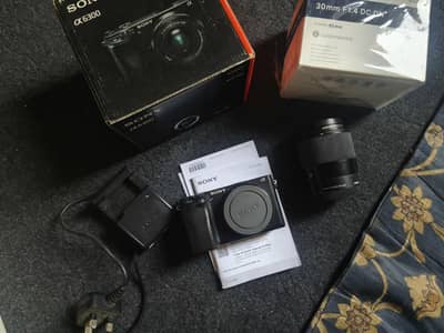 Sony A6300 Mirrorless Camera + 30mm f 1.4 Sigma Lens