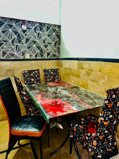 dining table achcha banaa hua hai per se pura shishe wala frame  chair
