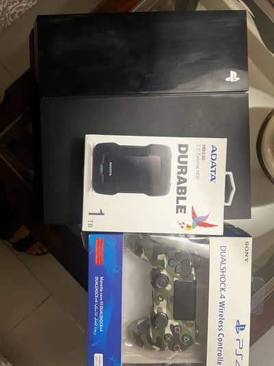 PS4 Fat 500GB with original controller 1TB HDD