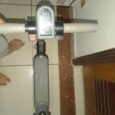 electric scooty gery colour one hand used and only 10 to 15 time uses