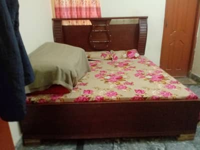 double bed with matrix