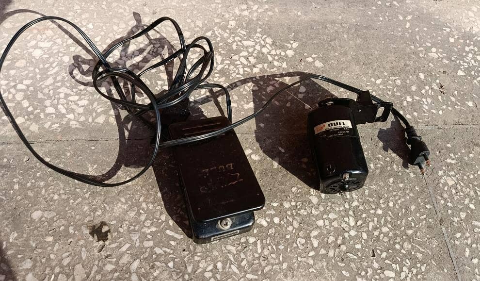 Sewing machine motor with controller 0