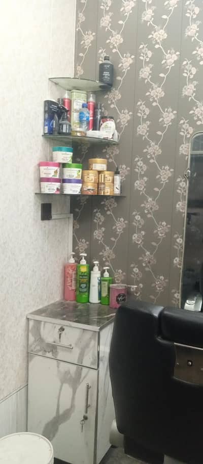 Saloon chairs, mirror, and toralies