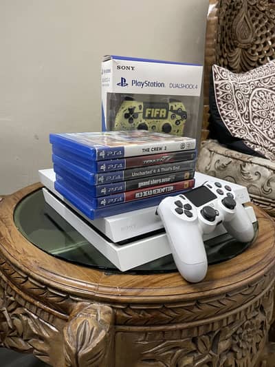 Ps4 1 tb with 2 controllers and 4 games