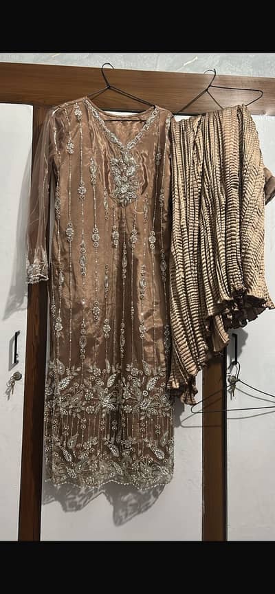 brown color of sharara with net work on it 3 piece fancy eastern dress