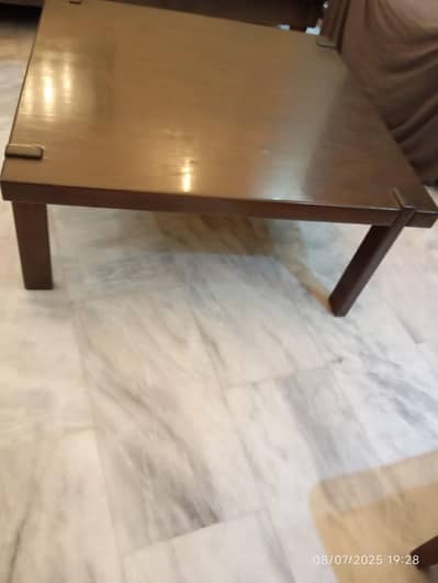 Wooden table with side tables