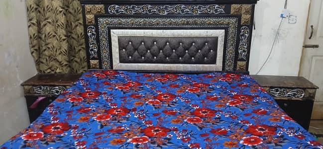 king size bed with two side table one dressing