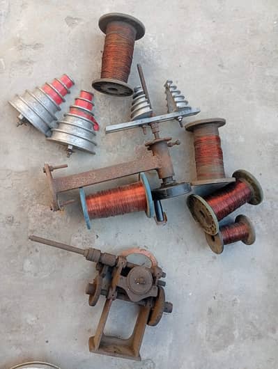 manual motor coil winding machine with coil forms and spools of wires