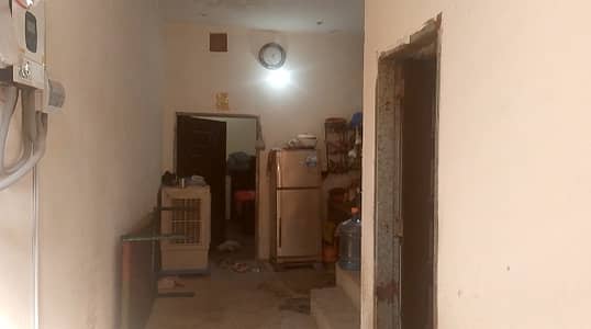 2.5 Marla house for sale near Ferozepur road gajjumate and New defence road and few steps from 200ft kahna nau Lahore