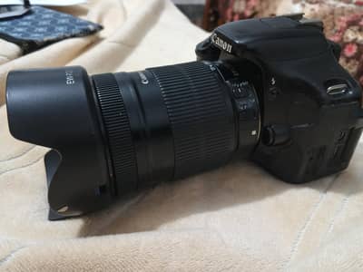 conon 600d with 18-135mm lens and with external flash.