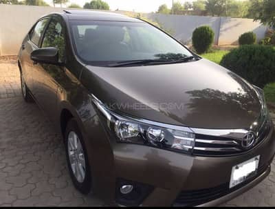Toyota Corolla Altis Grande 2015 Bronze Mica, full option, 1st owner