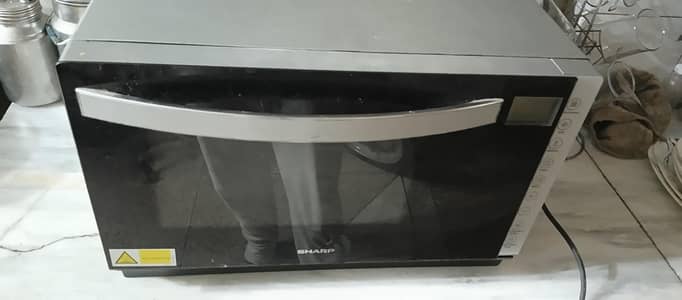 Sharp Microwave Oven | Grill | defrost | reheat | cook.