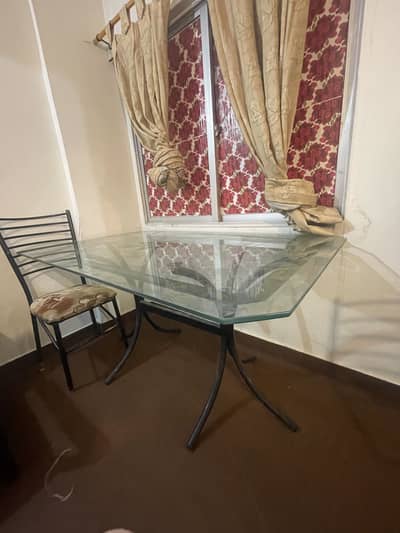Dining table & chairs with glass top