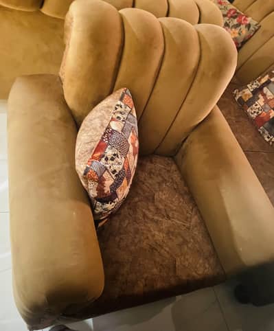 Seven seater sofa with table two pink ottoman one round mirror table