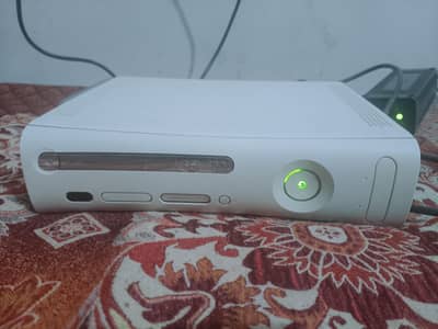 Xbox 360 console with one controller