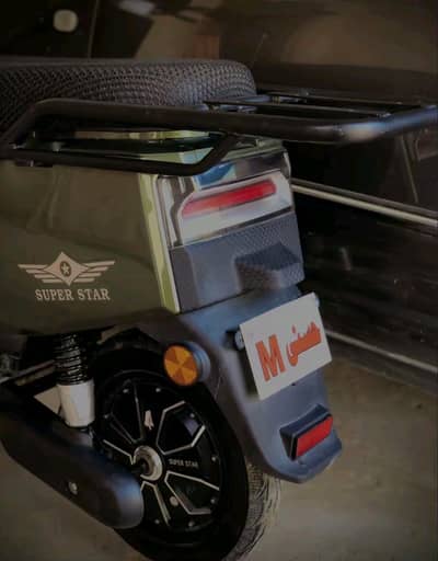 super star electric scooty