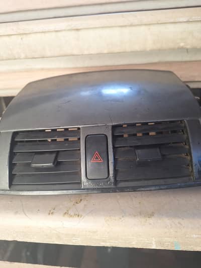 toyota corolla dashbord center ac vent cover with button and ac grill