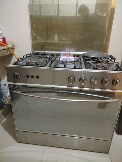 Cooking Range  5 burner and oven in working condition