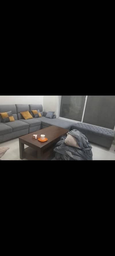 L shaped sofa with pufy