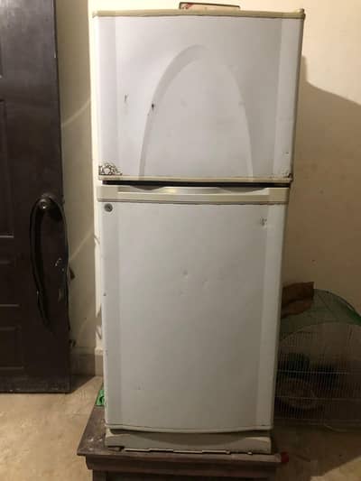medium size refrigerator in good condition.  contact #