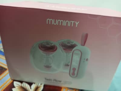 Electric breast pumps